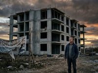 بناية سكنية غير مكتملة على أرض عارية ترمز لمخاطر النصب العقاري والشراء على التصميم بالمغرب